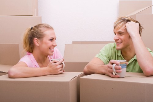 Professional movers handling furniture