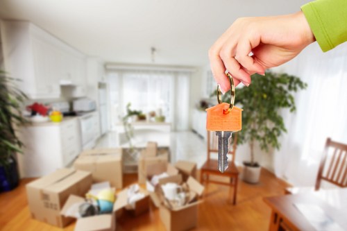 Removalist professionals handling furniture for a move in Storage Kensington