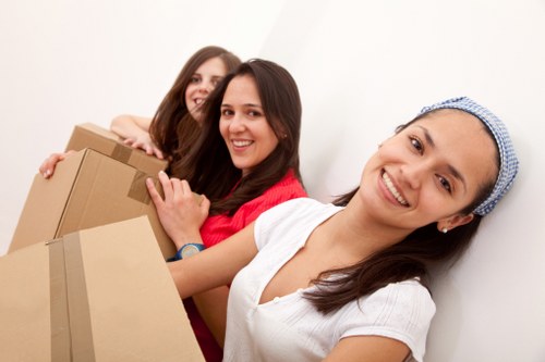 Team setting up new office space after a move in Storage Kensington